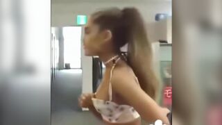 Stretching her cup - Ariana Grande Tits