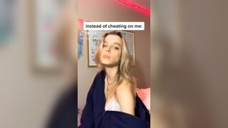 Presenting her tits