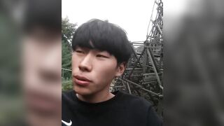oriental dude gets his dick sucked off on a carnival ride.