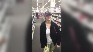showing Off Her Wonderful Milk cans Inside A Store
