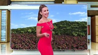 Hot reporter dancing before her forecast