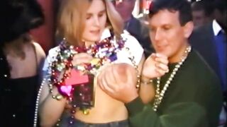 Hucow: Large tittied gal lifts up her shirt and begins spraying people with breast milk at Mardi Gras