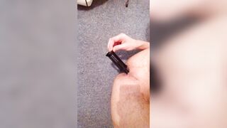 training my butt with a lint roller handle