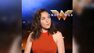 Gal Gadot trying to swallow a load before the camera's turn back on to continue the interview - Celebs