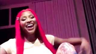 nicki Minaj feeling and bouncing her large love bubbles for us