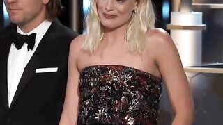 Celebrities: Margot Robbie on stage, realizing she mistakenly put on the vibrating pants after you turn it on...
