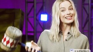 Celebrities: Would you take a whack to the cock and balls from Margot Robbie?