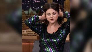 Celebrities: Selena Gomez putting her hair up in advance of giving you a sloppy oral sex