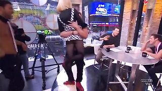 Carrie Keagan's skirt gets lifted on tv - Celebs