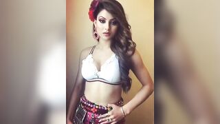 urvashi 'Randi' Rautela. Doing what that babe does most good, and acting like a true whore that she's.