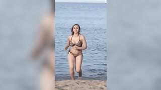 Her perfect body on the beach made me cum last night.