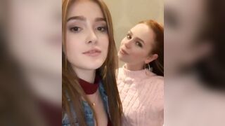 two redheads showing each other some live