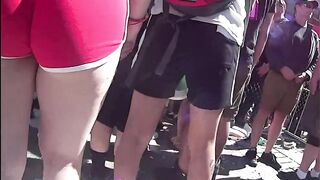 huge booty in taut red shorts