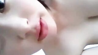 Wet Asians: Cute, large titted girl plays with herself