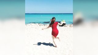 Thick Asian chick on the beach... - Juicy Asians